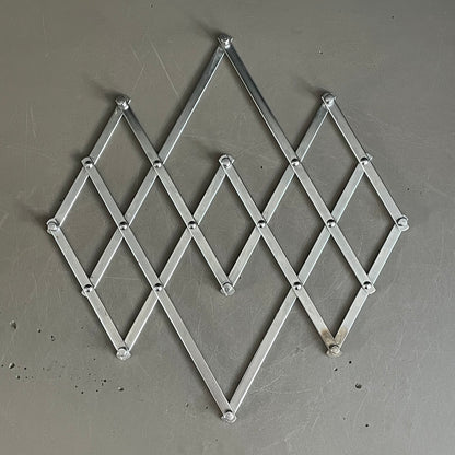 Dessous de plat articulé en métal argenté - Ref 941