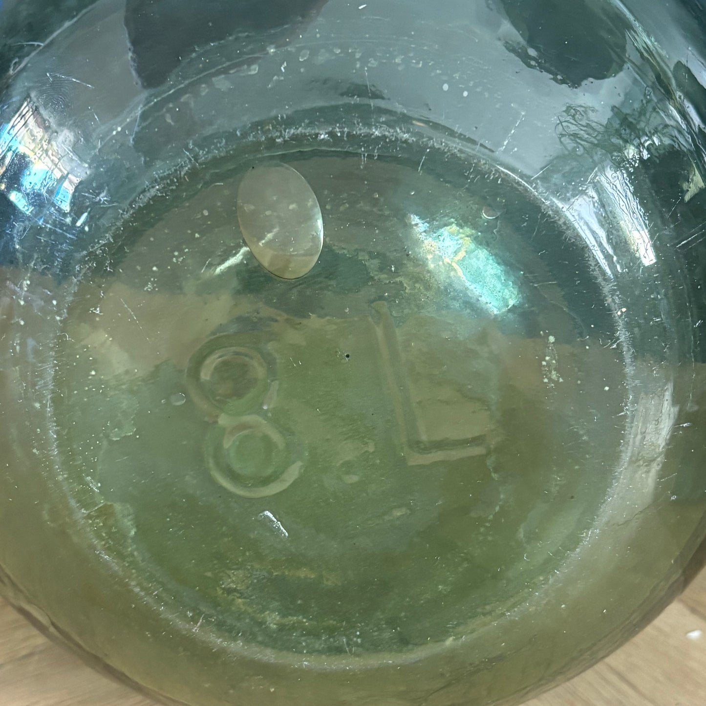 Dame-jeanne ancienne en verre vert - Ref 1307