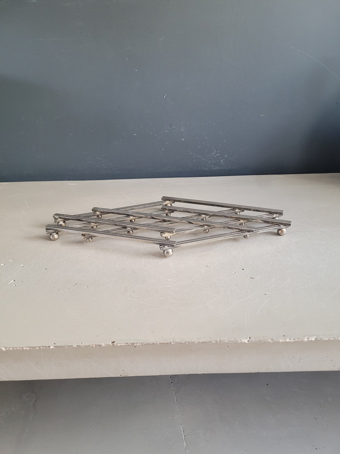 Dessous de plat articulé en métal argenté - Ref 1034