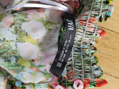 Top court zara XS motif fleuri