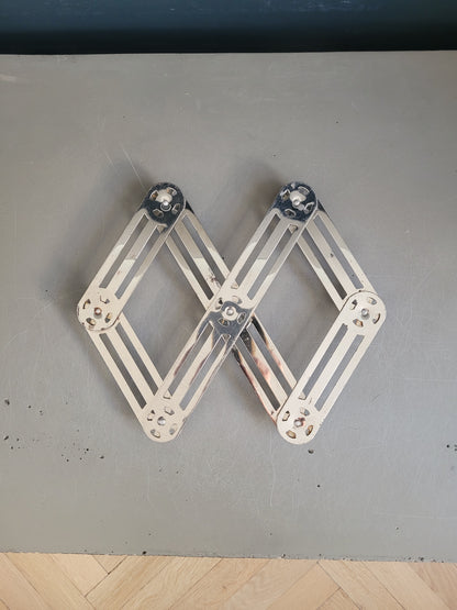 Dessous de plat articulé chromé  - Ref 604